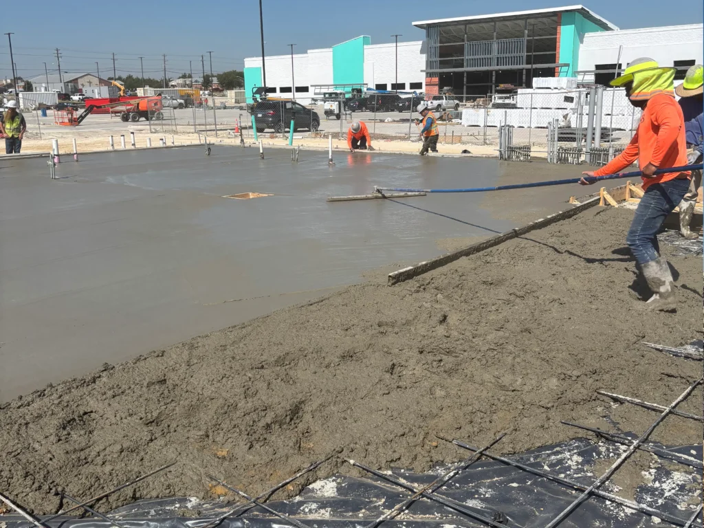 Pouring a commercial concrete slab for Tom Thumb in Midlothian