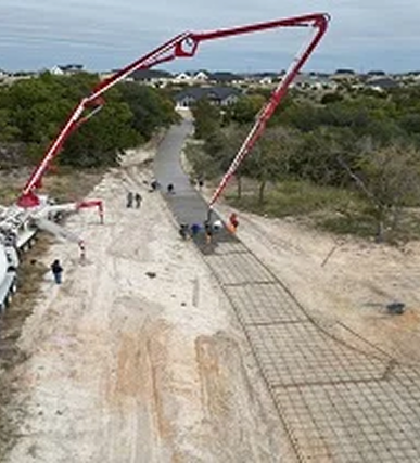 Concrete pouring at construction site