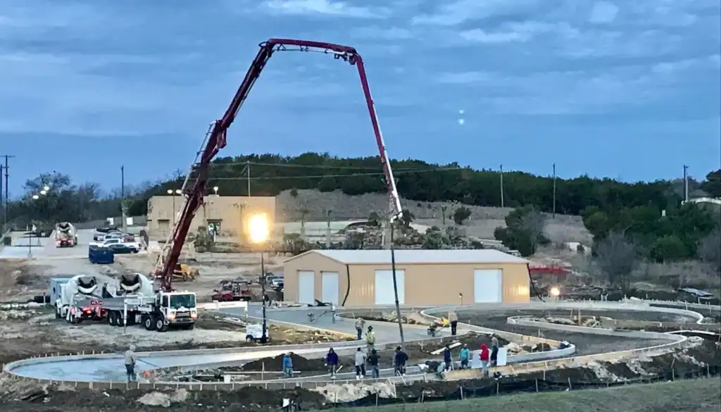 Rios Brothers pouring concrete at a construction site in Texas.
