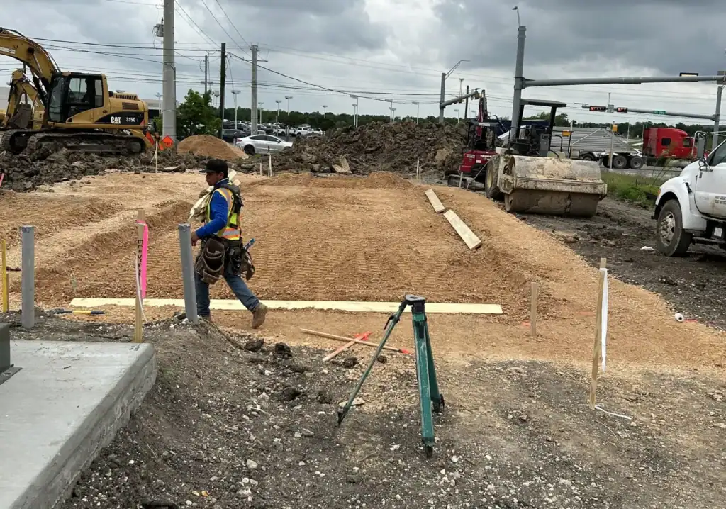 Excavation and grading work underway for new development project.