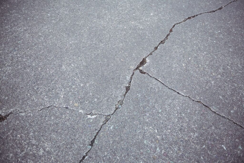 Close-up of cracked concrete surface