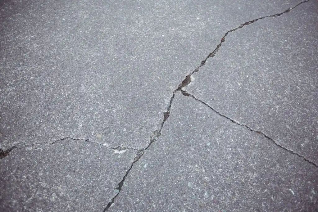 Close-up of cracked concrete surface